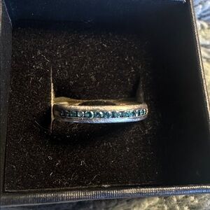 Blue diamond and silver ring